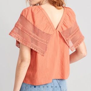 NWT Old Navy rust-colored top with eyelet lace, flutter sleeves.